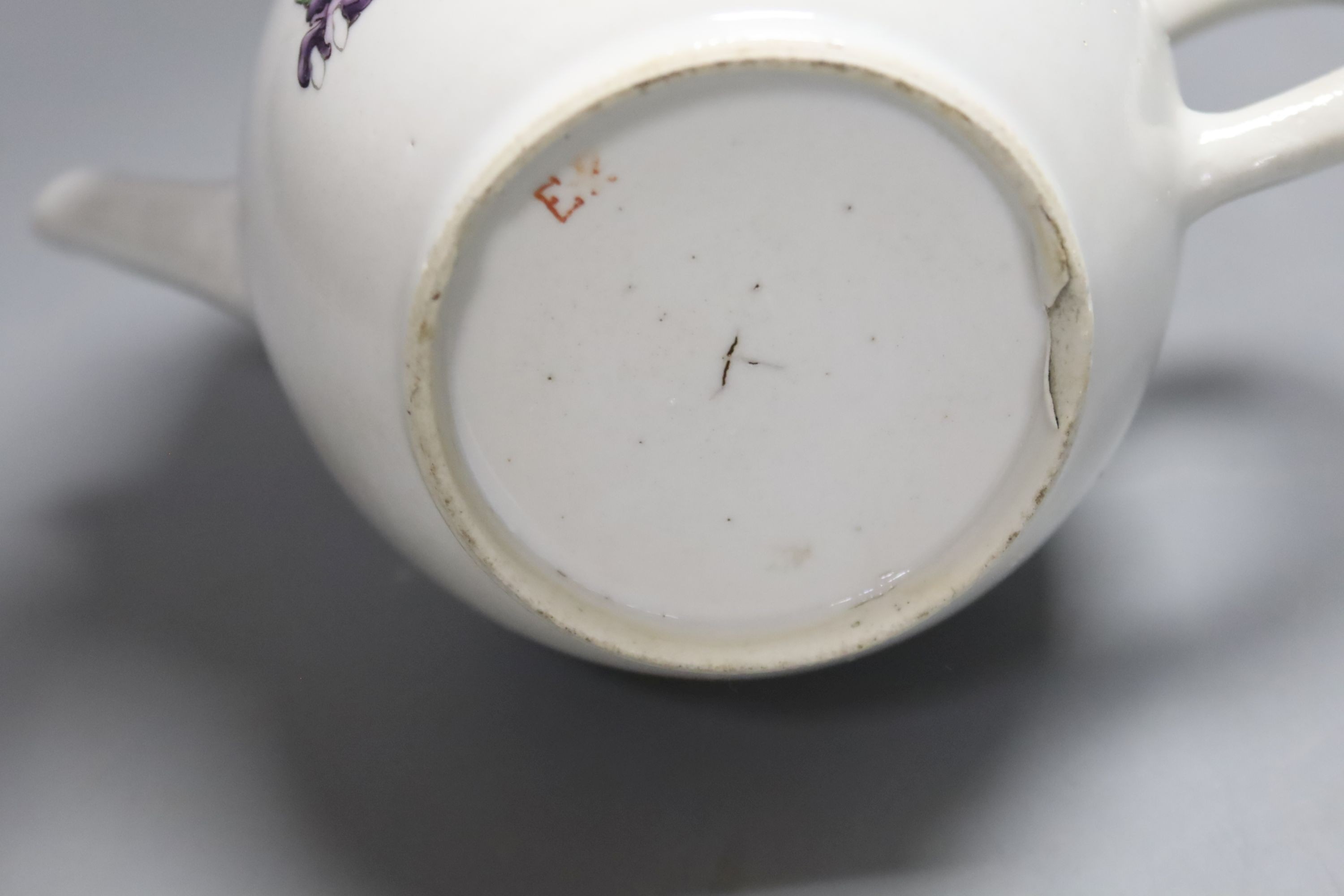 A Chinese export documentary famille rose spherical teapot and cover, the underside monogrammed E.R., height 14cm (faults)